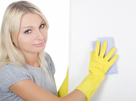 Professional cleaners maintaining a Lambeth office kitchen and workspace