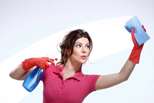 Local cleaner working in a flat in Lambeth